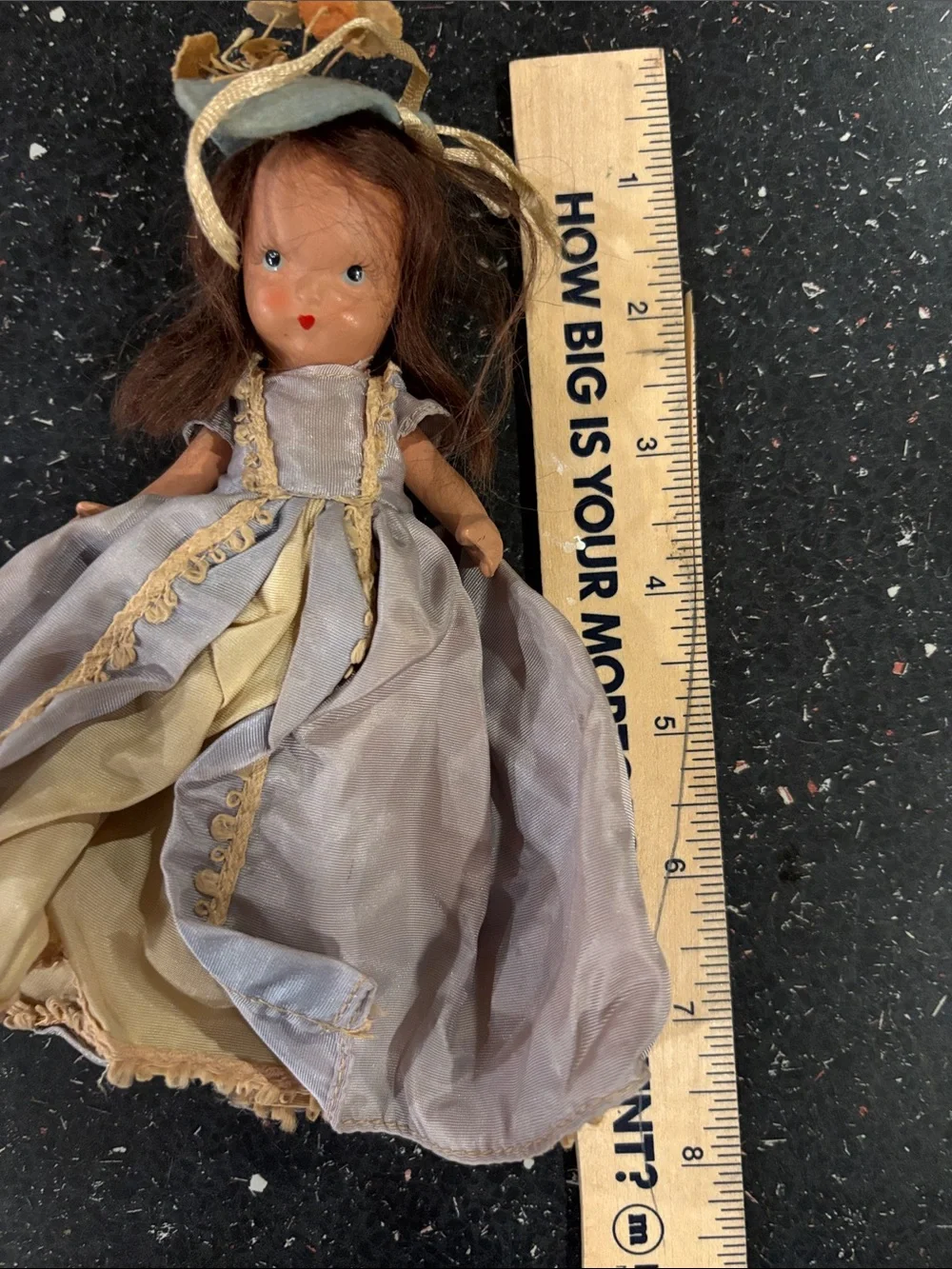 Vintage NaPorcelain Doll in Pale blue and Gold Gown labeled “Storybook doll